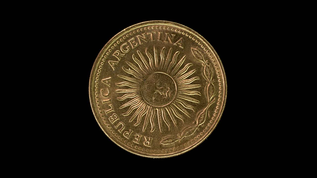 Argentina 1978 10 pesos coin obverse showing Sun of May rotating on black background