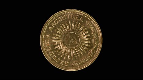 argentina 1978 10 pesos coin obverse showing sun of may rotating on black background