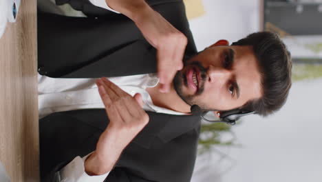 Businessman working wearing headset call center support service operator office helpline