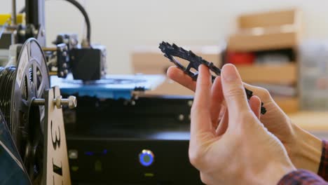 mechanic checking chain ring in workshop 4k