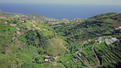 aerial panning up from valley overlooking atlantic ocean on madeira portugal