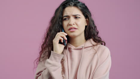 woman on phone frustrated