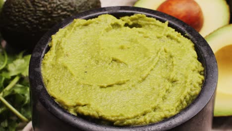 guacamole in a stone bowl