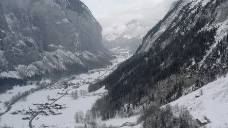 Drone-Aerial-of-Lauterbrunnen-surrounded-by-the-Mountain-Eiger-in-the-swiss-alps