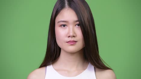 young beautiful asian businesswoman covering mouth as three wise monkeys concept