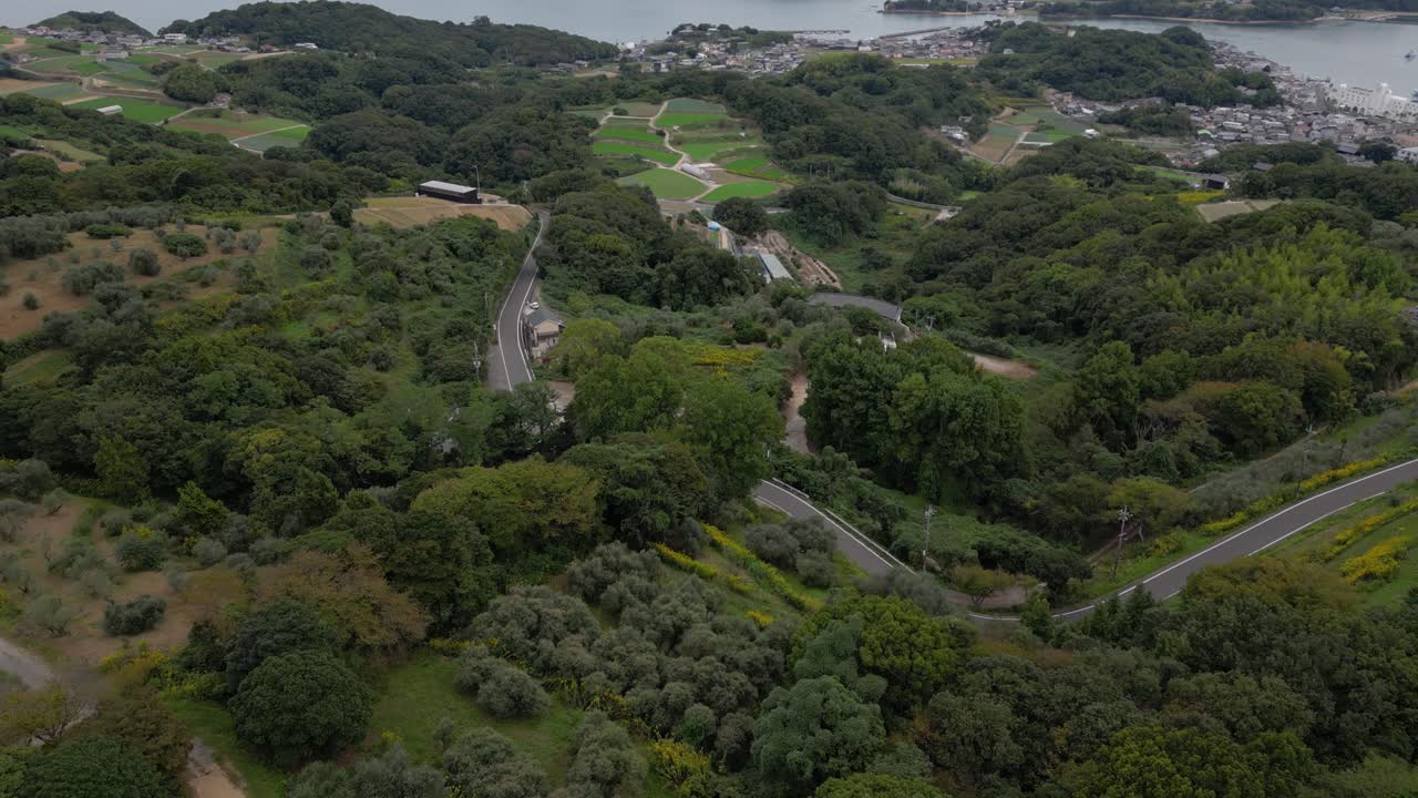 Shodoshima Island in distance, slow drone cinematic reveal