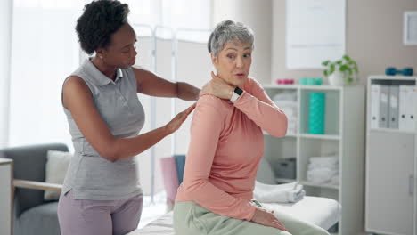 physical therapist giving massage to senior woman