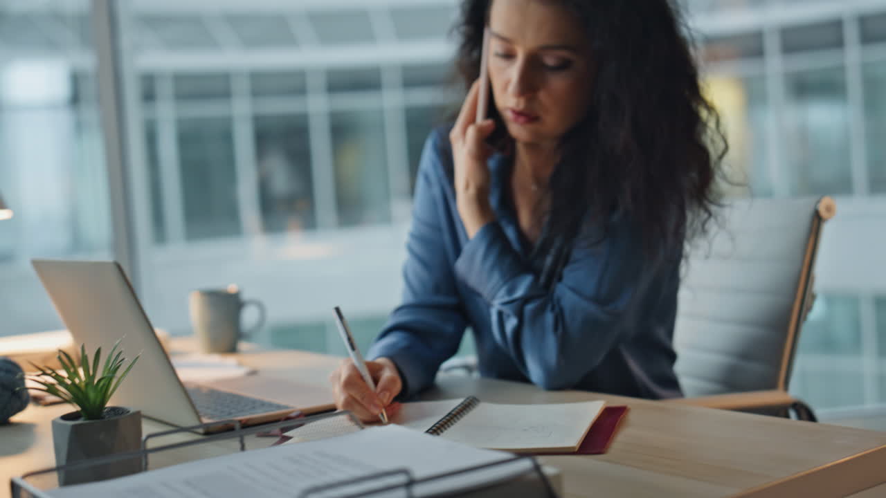 Focused businesswoman phone call in modern office. Closeup boss discussing work