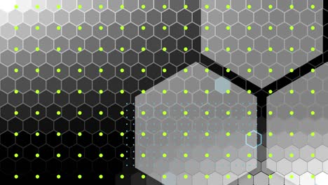 Green-dots-and-hexagon-mesh-with-large-grey-hexagons-moving-on-black