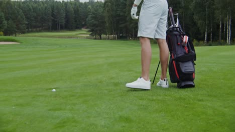 man playing golf on a golf course