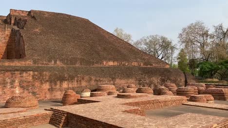 cinematic shot of the ruins of old nalanda university historic indian architecture