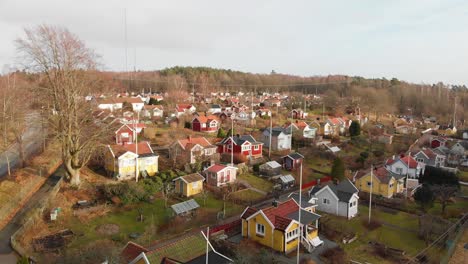 aerial footage of some beautiful picturesque cottages in delsjon, gothenburg, sweden-5