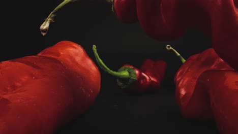 four fresh red hot peppers