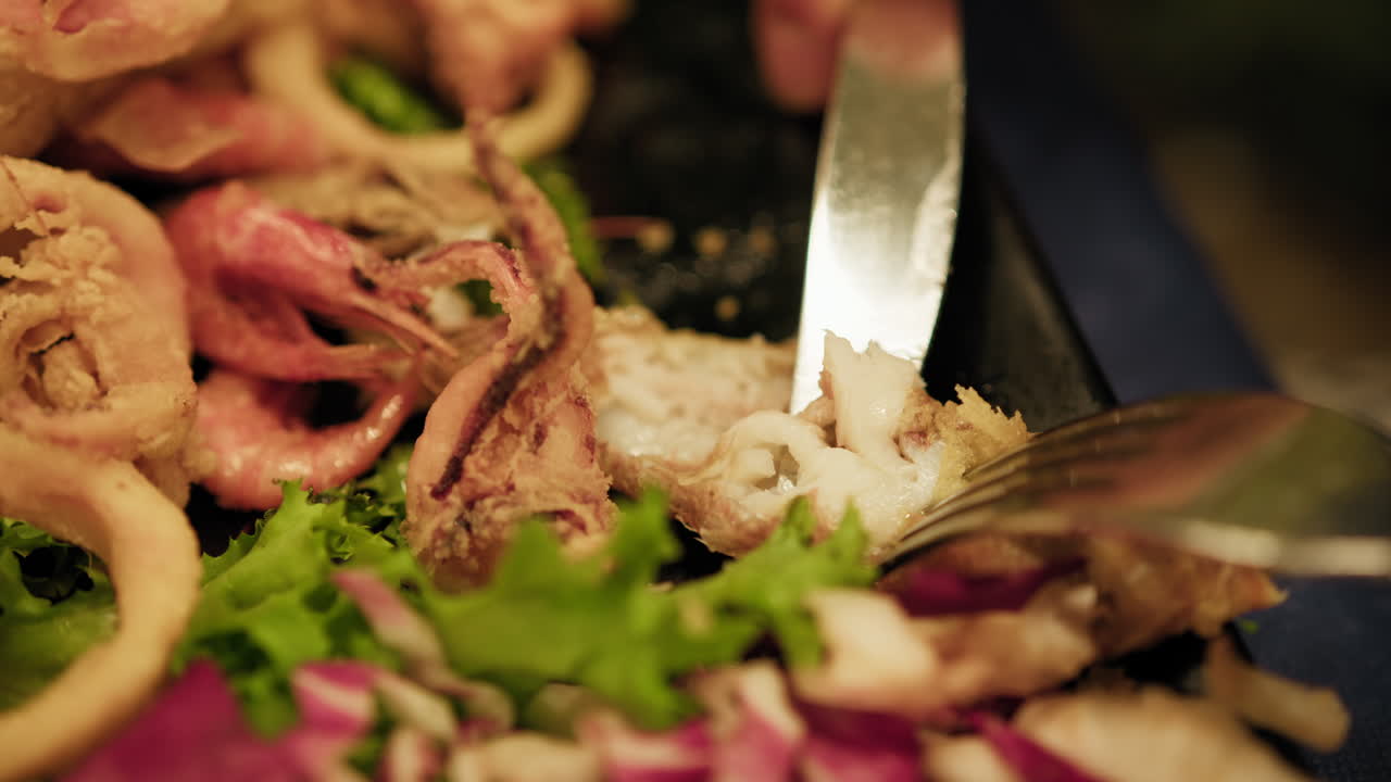 Fork And Knife Grabbing Shirmps During Gourmet Dinner