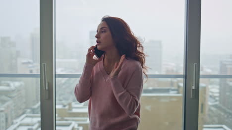 nervous woman calling cellphone modern company workplace closeup. lady talking