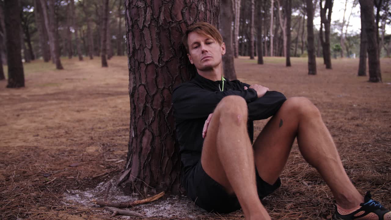 Solo Individual Man with Pine Tree Forest Surrounding Him