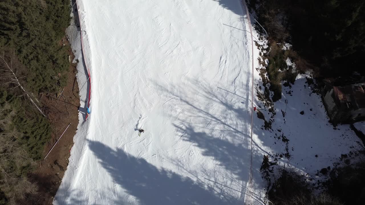 There are winter sports that play the role of the Winter Olympics in Cortina and Milano Italy. Learning to ski and snowboard I capture these videos with my drone that is in a ski resort.