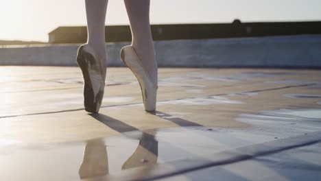 ballet dancer practicing on rooftop