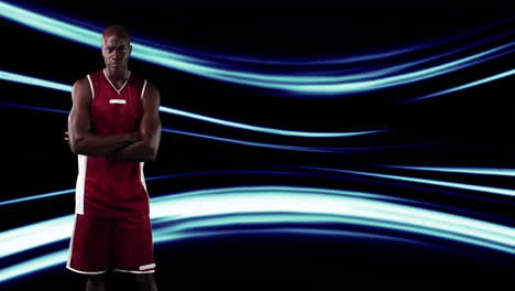 basketball player standing with crossed arms over blue light trails animation