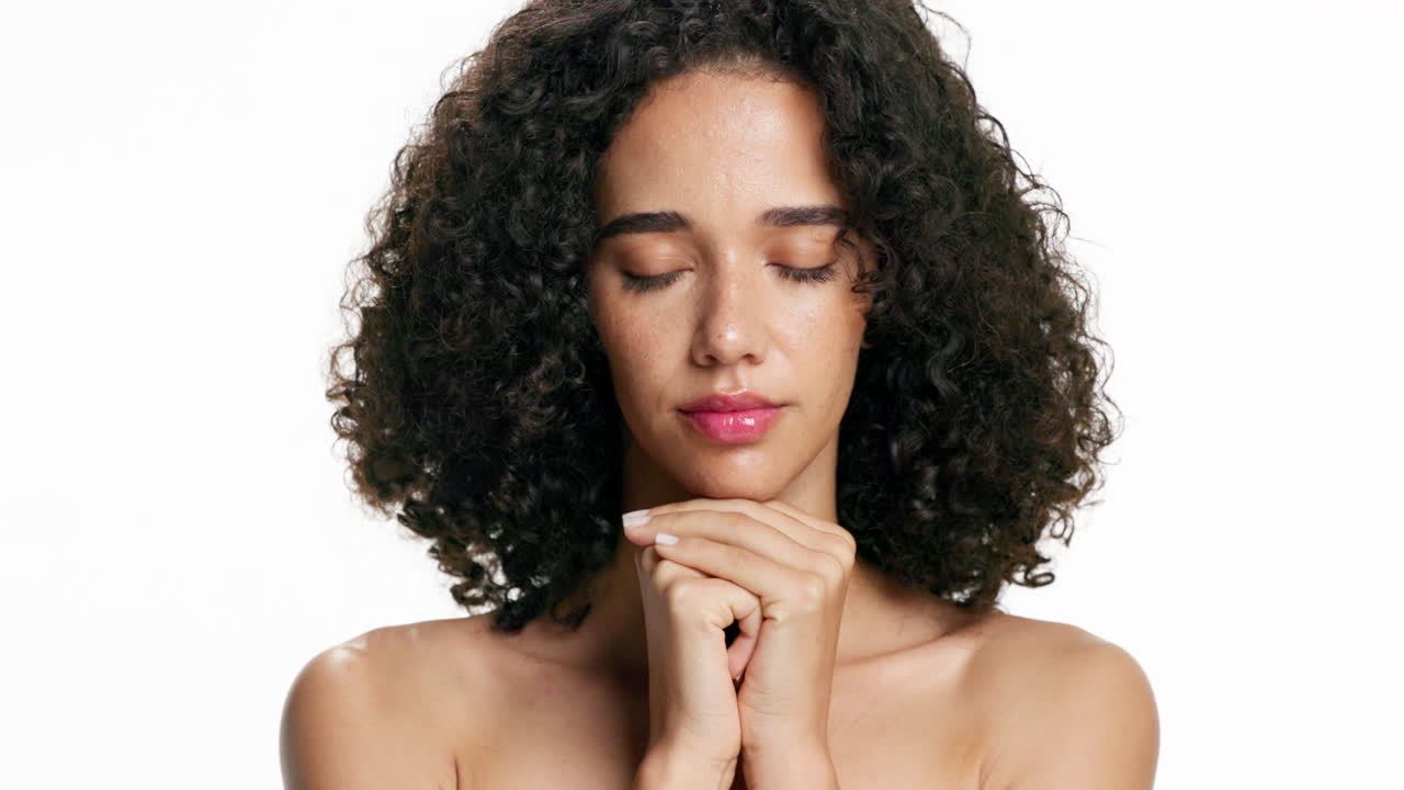 Portrait of a Beautiful Woman with Curly Hair