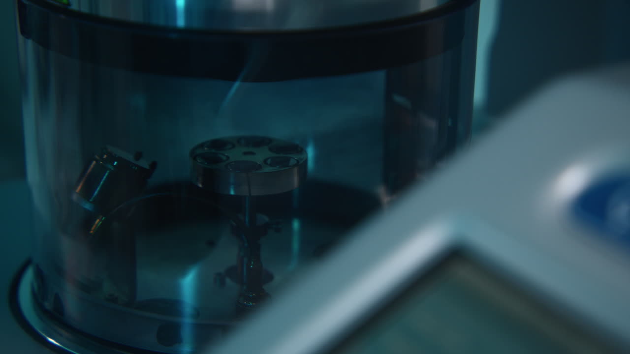 Close-up view of a Scanning Electron Microscope (SEM) sample chamber