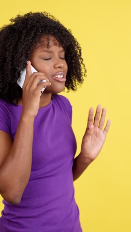 a woman expresses various emotions while talking on the phone