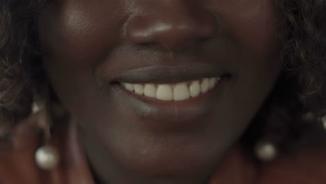 cropped shot of happy young woman smiling