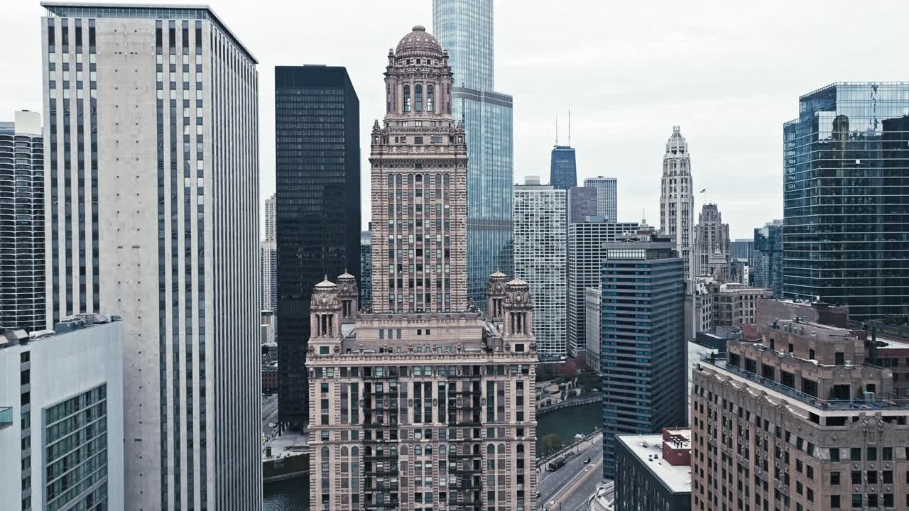 Aerial overview of the Tower framed by other high-rise buildings in downtown Chicago