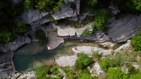 Birds-eye-view-of-swimming-in-a-natural-Papingo-Rock-Pools-in-Greece