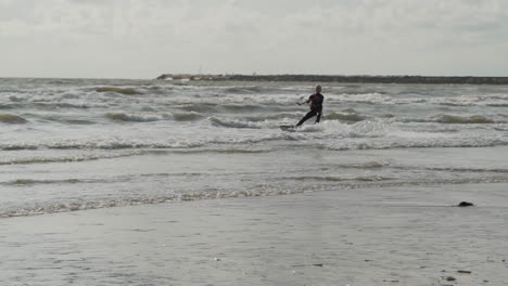 Kite-surfer-surfing-on-the-sea-in-slow-motion