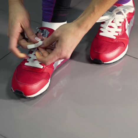 woman tying laces