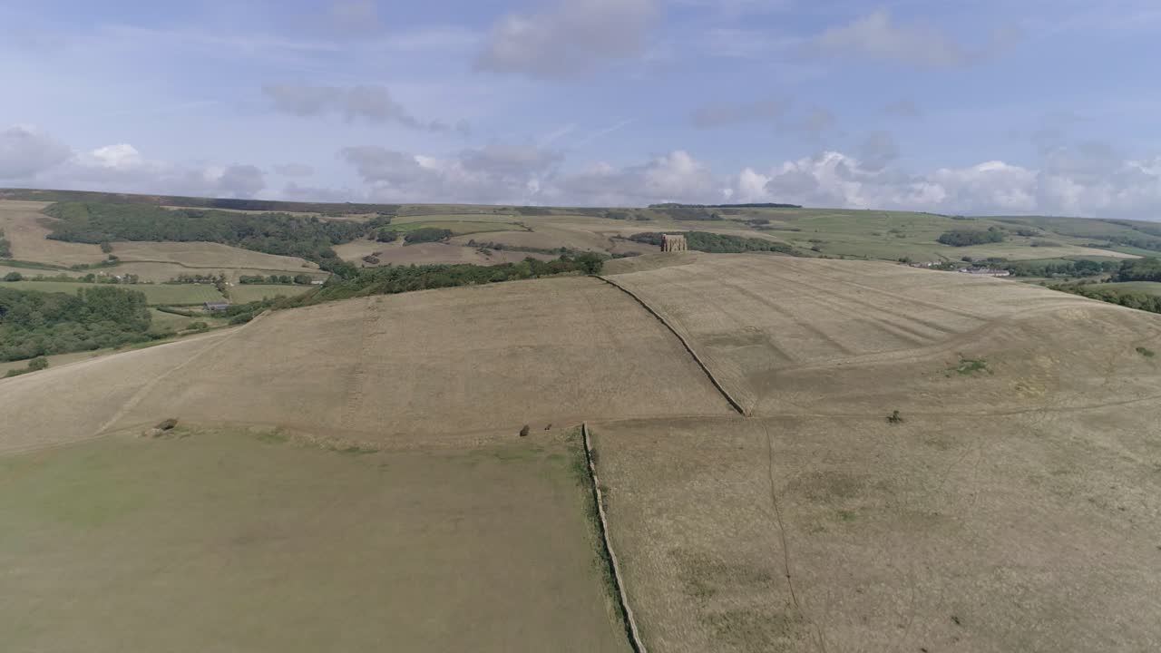 Aerial view of a hilly countryside landscape