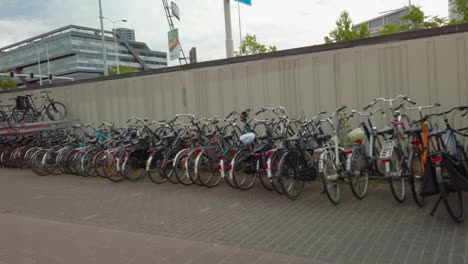 parking for bicycles on pavement in eindhoven, netherlands