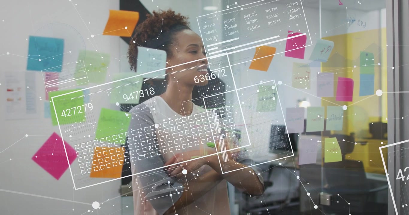 Mid-adult woman holding marker and adjusting sticky notes as overlay appearing for product planning