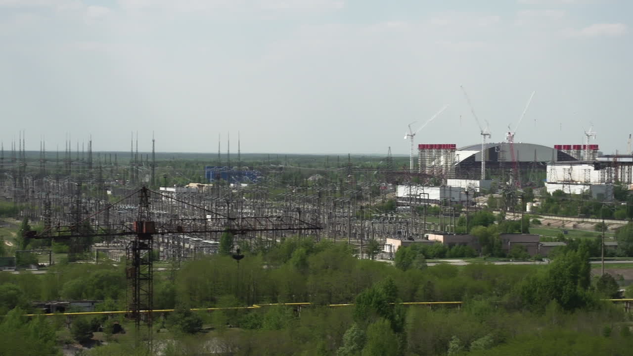 High-Voltage Electricity Line Of Chernobyl Nuclear Power Station In Ukraine. Panning Right Shot