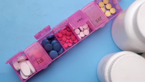 Close-up-of-medical-pills-in-a-pill-box-on-table