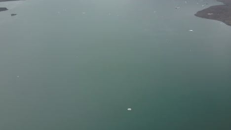 4k - iceland - diamond beach - glacier shot from drone