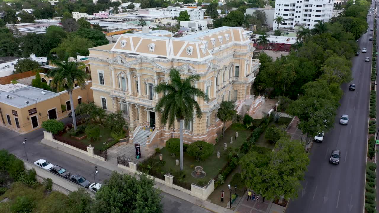 Aerial push in to the Palacio Canton museum mansion on the Paseo de Montejo in Merida, Yucatan, Mexico