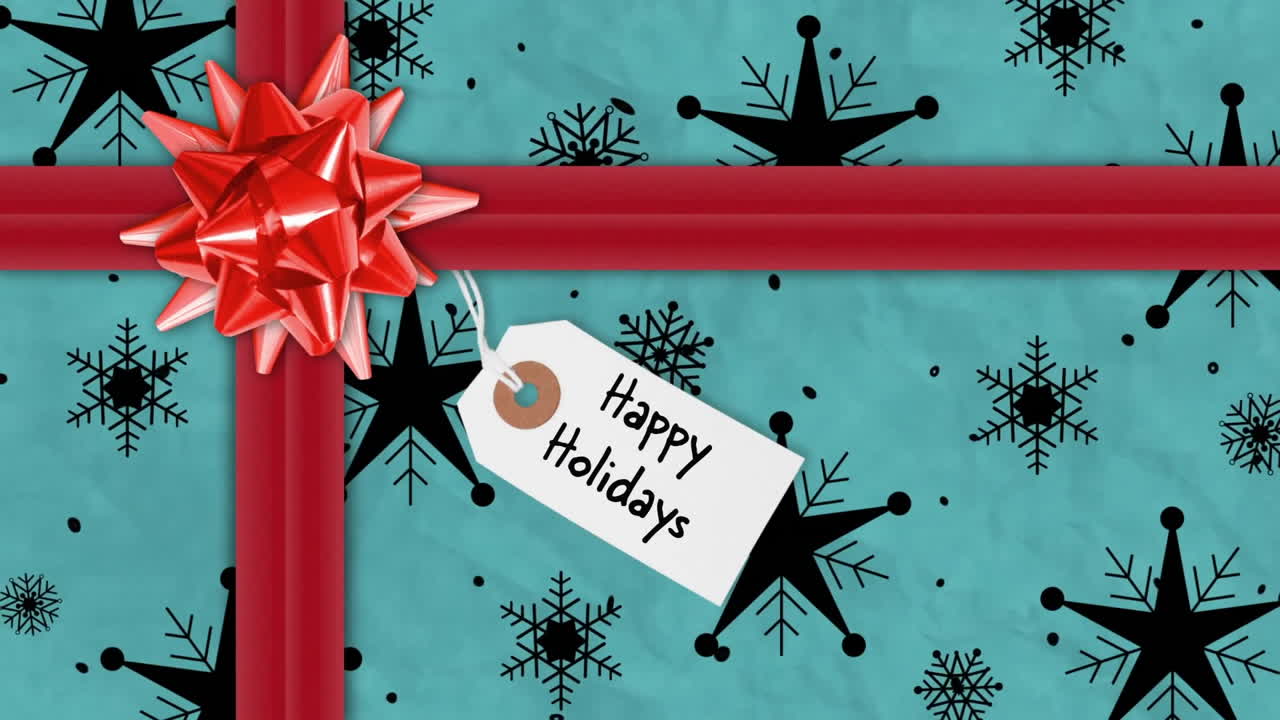 Animation of happy holidays text on tag over christmas present with red ribbon