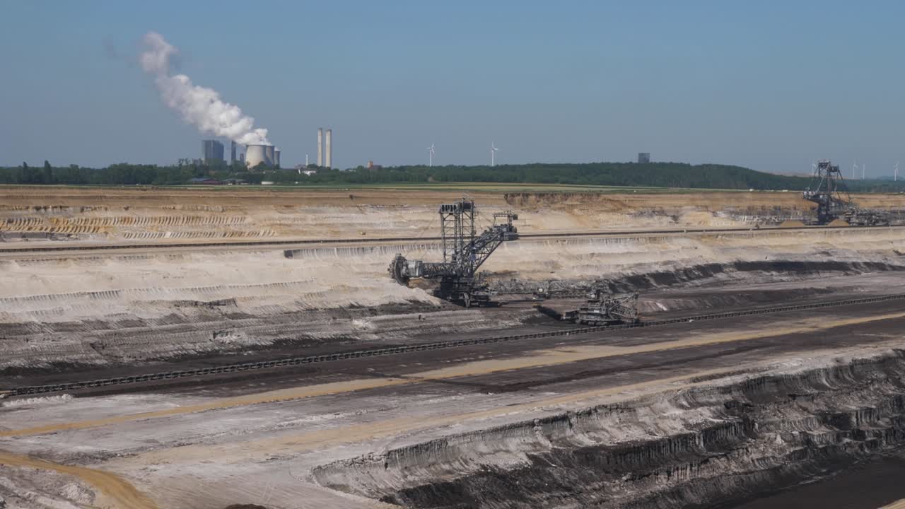 Hambach opencast lignite mine in the Rhenish lignite mining area near Düren, with Weisweiler Powerplant in background
