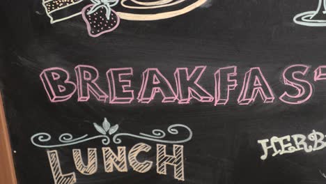 chalkboard menu with breakfast and lunch options