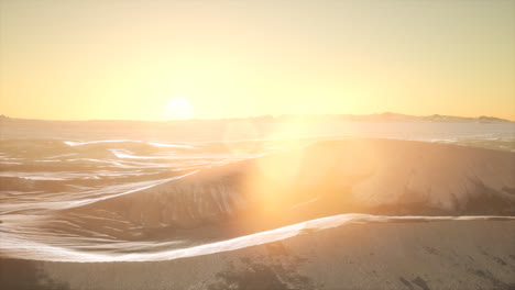 red sand desert dunes at sunset