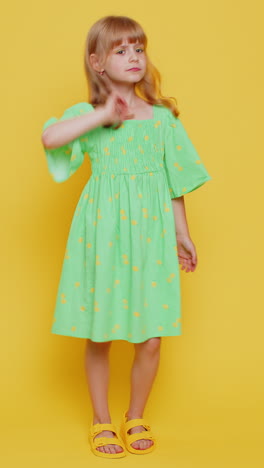 child girl kid trying hear you keeping arm near ear for louder voice asking to repeat deafness