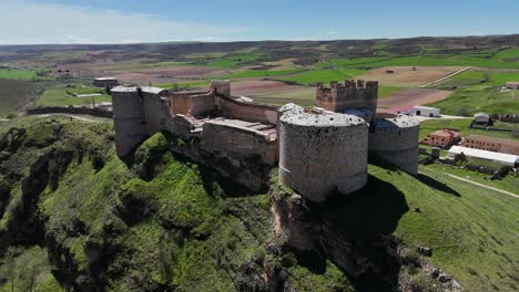 aerial drone closing up view of berlanga de duero castle, soria, spain