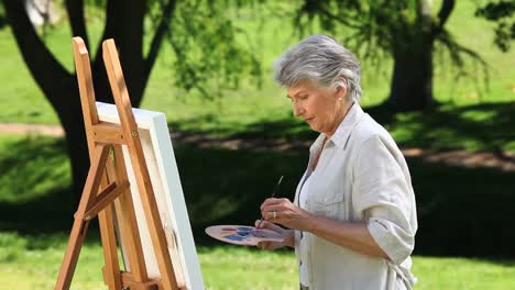 Old-female-painting-a-canvas