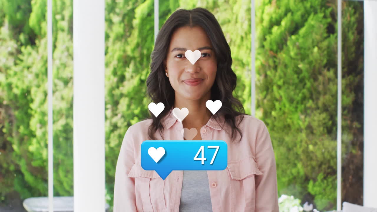 Smiling woman receiving social media likes animation over green background