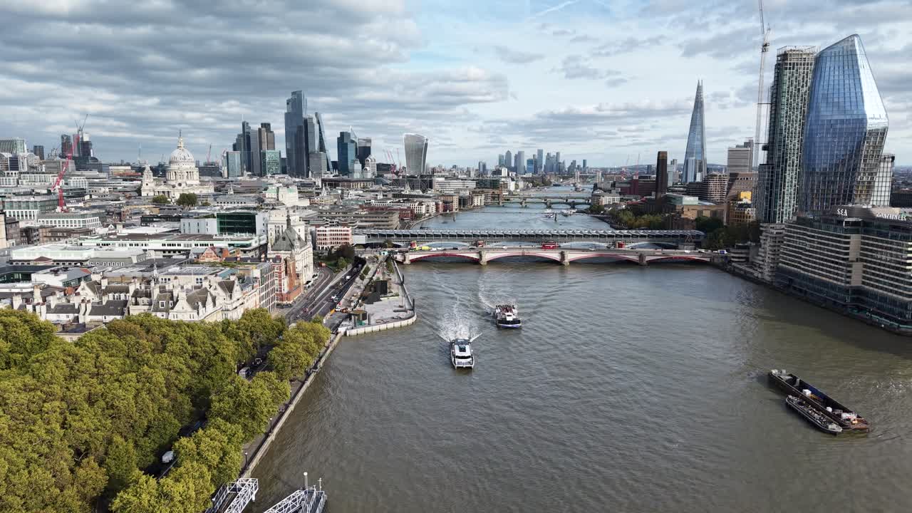 Blackfriars Bridge Panning drone aerial London UK city skyline in background
