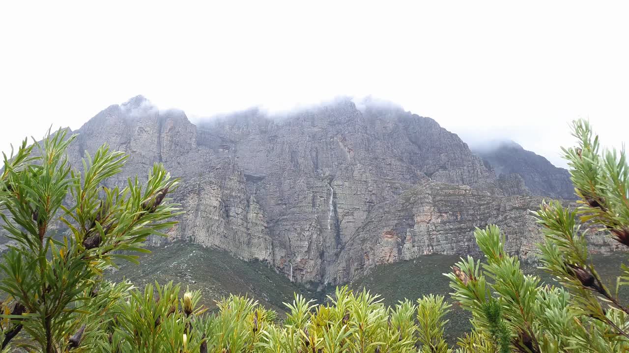 After heavy rains water gushes down a mountain gorge in South Africa, timelapse