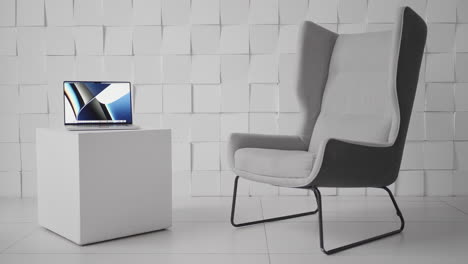 espacio de trabajo moderno con portátil y silla