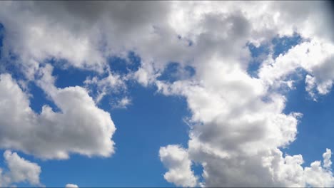 time lapse of clouds rolling across the sky, as they build and disperse when they move by